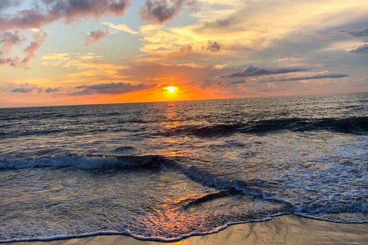 Sonnenuntergang auf einem Strand